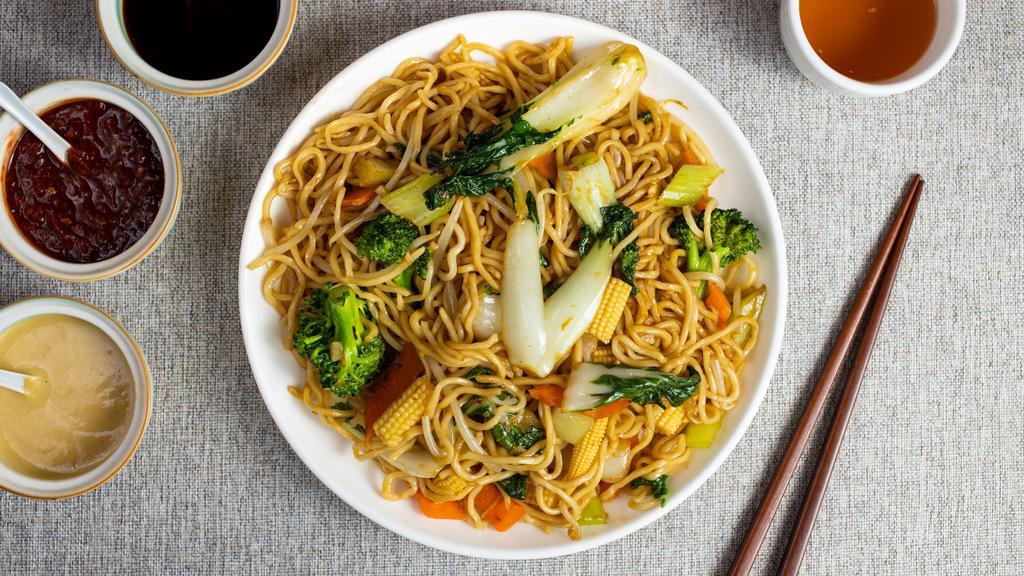 Lo Mein · Pan fried egg noodles tossed with seasonal vegetables and your choice of chicken, beef, or shrimp.
