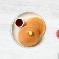 Classic Pancakes · Fluffy pancakes cooked with care and love served with butter and maple syrup. Three pieces.