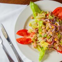 Italian Tuna Salad · Romaine lettuce, Italian tuna, corn, chick peas & tomatoes in a balsamic vinaigrette dressing.