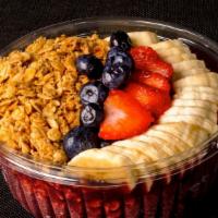 Acai Bowl · Acai, bananas, mixed berries, topped with bananas, strawberries, and granola.