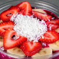 Pitaya Bowl · Pitaya, bananas, pineapple, mixed berries, topped with bananas, strawberries, and coconut fl...