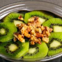 Green Bowl · Acai, banana, spinach, kale, spirulina topped with kiwi, bananas, walnuts, granola, and agave.