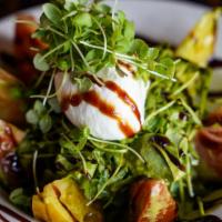 Heirloom Tomato · With burrata and basil.