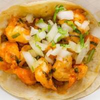 Shrimp Taco · Tiger shrimp is roasted on the plancha with roasted pineapple, our house made chipotle, and ...