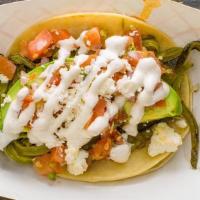 Nopales Taco · Nopales is roasted and garnished with pico de gallo, queso fresco, crema, and avocado. Inclu...