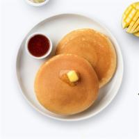 Classic Pancakes · (Three pieces) Fluffy pancakes cooked with care and love served with butter and maple syrup.