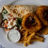 Gyro Pita · Gyro meat wrapped tight in grilled pita bread with tomato and red onion topped with tzatziki...