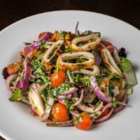 Grilled Calamari Salad · Char – grilled fresh calamari, tomato, red onions, parsley and mix green salad tossed with o...