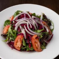 Kebab Salad (House) · Tomato, onion,red cabbage, mixed green and lettuce mixed with house sumac dressing and olive...