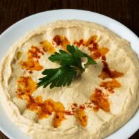 Humus · Chickpeas mashed into a paste with lemon juice and flavored tahini.