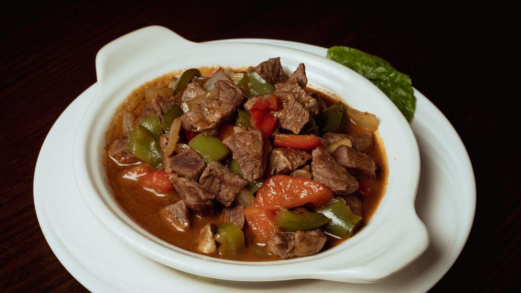 Lamb Sautée · Chunks of lamb sauteed with onions, mushrooms,green peppers, tomatoes,oregano. Served with rice.