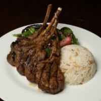 Lamb Chops (4 Pcs) · Baby lamb chops grilled to your taste
Served with salad and rice