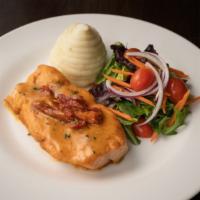 Salmon Scallopini · Cooked in garlic wine sauce and sun dried tomatoes served with mashed potatoes and mix green...
