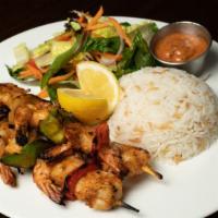 Grilled Shrimp · Char grilled shrimps in our chief's delightfully light sauce served with rice and mix green ...