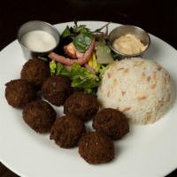 Dinner Falafel Plate (8 Pcs) · Deep fried chickpeas and vegetables, blended with Middle Eastern spices and tahini sauce on ...
