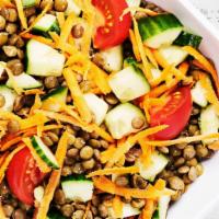 Lentil Salad · Vegetarian. Brown lentils, lettuce, carrots, cucumbers, tomatoes, onions, GRK vinaigrette.
