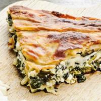 Spanakopita Pie · Vegetarian. Baked Village Style Pastry layers filled with Spinach, Herbs and Greek Feta Chee...