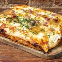 Carbonara Ssp Pizza · Smoked mozzarella, onion, and pancetta.