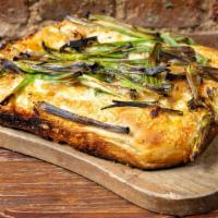 Onion Soup Ssp Pizza · Vegetarian. Caramelized onion, gruyere, and focaccia crumbs.