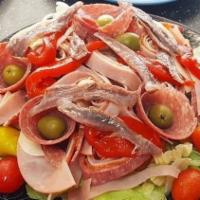 Antipasto · Lettuce, red cabbage, tomatoes, onions, green and sliced black olives, red peppers, artichok...