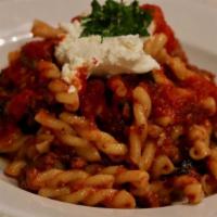 Gemelli Pasta · With sauteed sausage, tomato sauce, and a dollop of fresh ricotta.