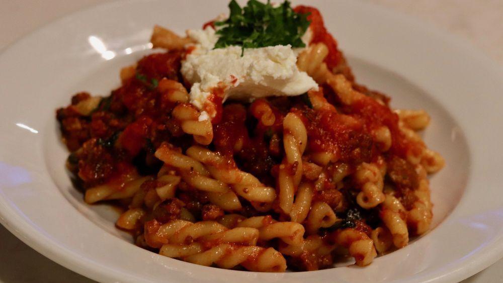 Gemelli Pasta · With sauteed sausage, tomato sauce, and a dollop of fresh ricotta.