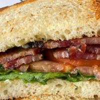 The Bacon · House made, thick cut bacon with lettuce, tomato and herb mayo on toasted sourdough.