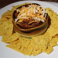 Kawan'S Chili · Ground Beef Brisket blend with melted Cheese, Beans,
Onions & Peppers served with house made...