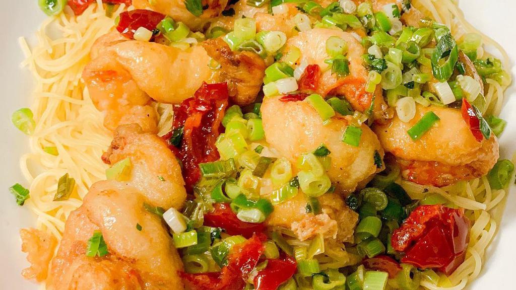 Ginger Scallion Shrimp · Dairy free, gluten free. Shrimp, baby corn, carrot and snap pea tossed in our ginger scallion sauce over rice topped with sesame seeds.