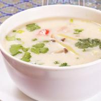 Tom Kha · Coconut ginger soup with lemongrass, galangal, lime leaves, ginger, mushroom, onion, and cil...