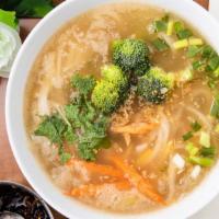 Tom Yum With Handmade Noodle Soup · Tom yum soup with handmade rice tapioca noodle. With ginger, onion, carrot, broccoli, cilant...
