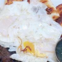 Colombian Brunch · Grilled steak, chimichurri sauce, arepa with cheese, eggs any style.