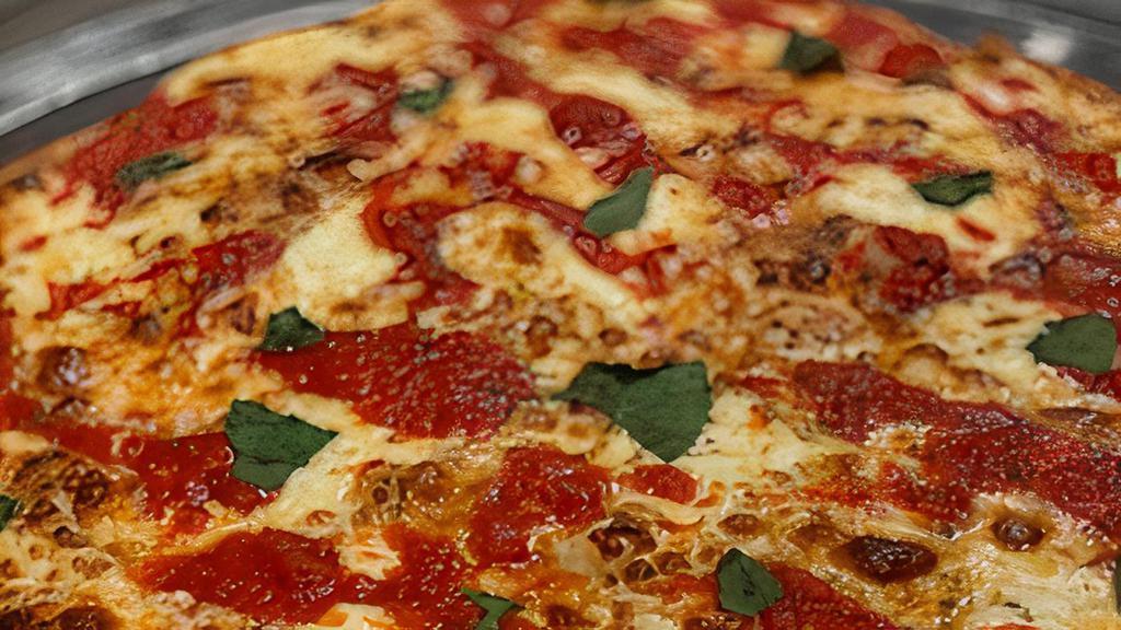 Grandma · Thin pan pizza with mozzarella and fresh San Marzano plum tomatoes.