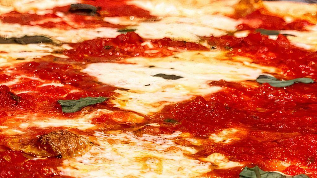 Margherita · Neapolitan style crust topped with fresh San Marzano tomato sauce, fresh mozzarella, basil and a drizzle of EVOO.