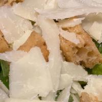 Caesar · Romaine lettuce, homemade croutons, topped with freshly shaved grana padano with Caesar dres...