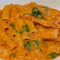 Rigatoni Fiorentina · Tender chicken pieces, spinach & mozzarella tossed in creamy pink sauce