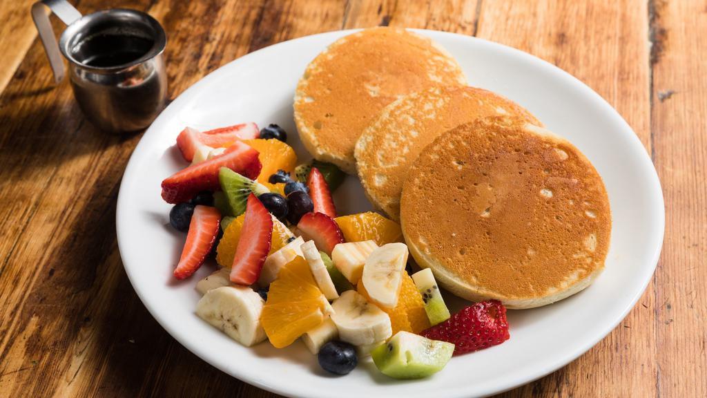 Pancakes · Served with fresh seasonal fruit.