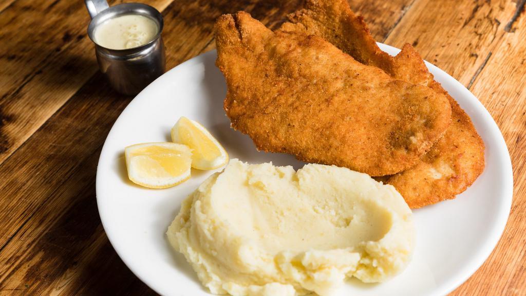 Chicken Schnitzel · Served with mashed potatoes and honey mustard dressing.