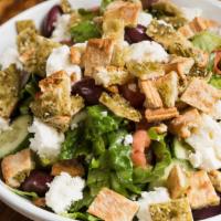 Greek Salad · Romaine lettuce, cucumber, tomato, onion, kalamata olives, feta cheese, and za'atar croutons.
