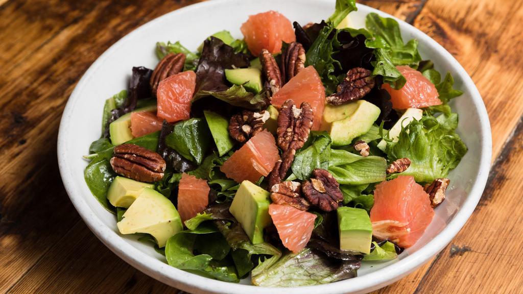 12 Chairs Salad · Mesclun, avocado, grapefruit, roasted pecans, and 12 Chairs vinaigrette.