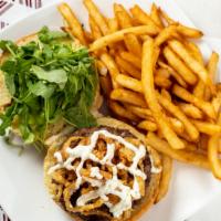 Bistro Burger · topped w/creamy horseradish sauce, crispy onion straws & organic baby arugula + fries