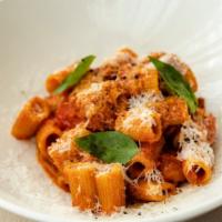 Amatriciana  · Mezzi Rigatoni, Crispy Guanciale, Tomato Sauce, Parm, Basil