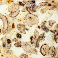 Tartufata Pizza · Shaved parmesan, mozzarella, mushrooms, truffle cream