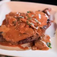 Sirloin Steak In Mushroom Sauce · 9oz. Sirloin steak with a creamy chipotle and mushroom sauce. Served with rice and beans.
