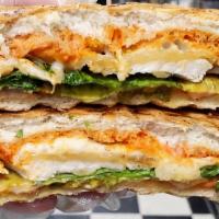 Buffalo Chicken · Breaded chicken cutlet, melted provolone, lettuce, hot sauce, and blue cheese on homemade fo...