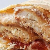 The Tipsy Chick · Breaded chicken cutlet, melted mozzarella, ricotta and homemade vodka sauce in a grilled wrap.