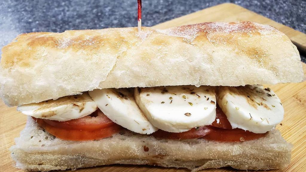 Mozzarella Caprese - Whole Size · Fresh mozzarella, tomato, olive oil, balsamic vinegar, and oregano on toasted stretch bread



*Stretch bread availability varies. Sandwich will automatically be substituted to White Sub Roll if we're out of Stretch bread.