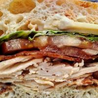 The Doctor - Whole Size · Roast turkey, bacon, creamy blue cheese, provolone, hot sauce, lettuce and tomato on stretch...