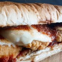 Chicken Parmesan - Half Size · Breaded chicken cutlet, homemade marinara, melted provolone on a toasted sub roll roll.