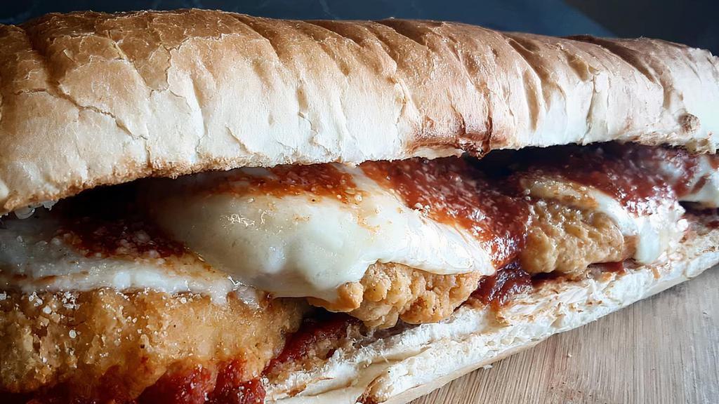 Chicken Parmesan - Half Size · Breaded chicken cutlet, homemade marinara, melted provolone on a toasted sub roll roll.